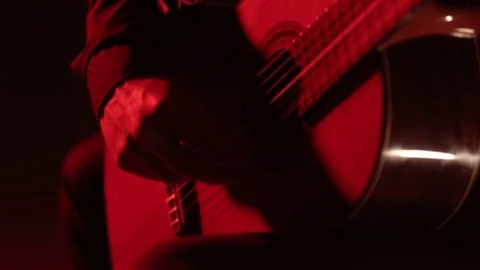 Close-up of guitar strings and fretboard,man playing an acoustic guitar,isolated Stock Footage 121583878