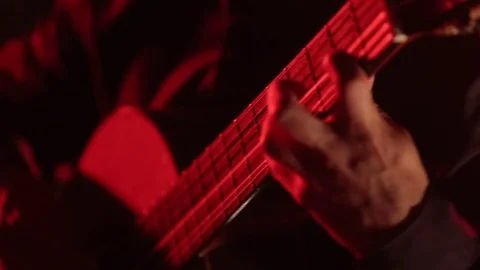 Close-up of guitar strings and fretboard,man playing an acoustic guitar,isolated Stock Footage 121583903