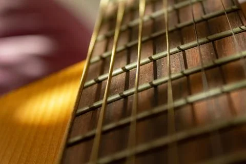 Close up of a guitar strings from bottom 库存照片