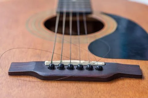 Close up of guitar with torn string Foto stock