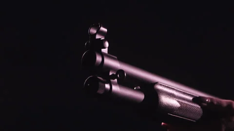CLOSE UP ON GUN MUZZLE AS IT SHOOTS, GUNSMOKE COMES OUT OF THE BARREL 스톡 동영상 34746978