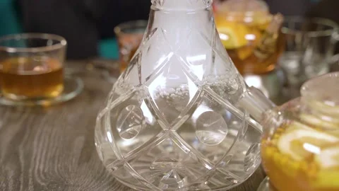 Close-up of gurgling water in a hookah flask. Stock Footage 106523213