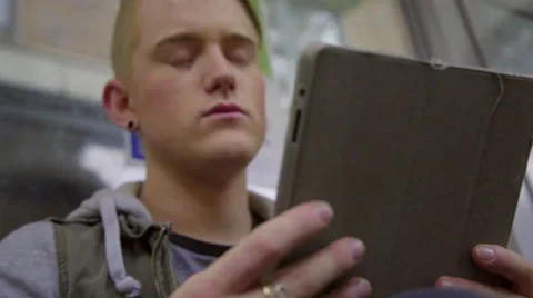 Close up of guy using tablet computer Stock Footage 54083926