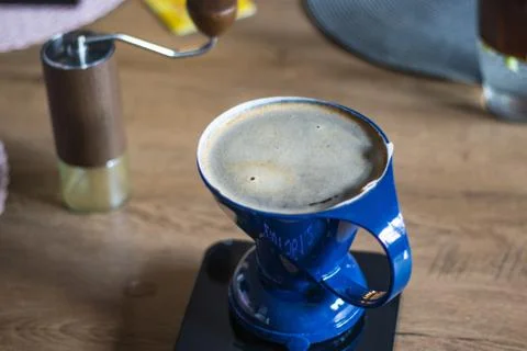 Close up h alternative method called Dripping. Pink Coffee grinder, coffee st Stock Photos