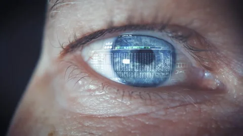Close up of hacker with blue colored iris having animation of computerized Stock Footage 172520717