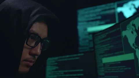 Close Up Hacker Face Hacking With Code On Multiple Computer Screens Stock Footage 157497510