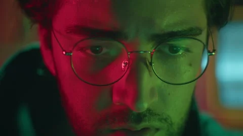 Close-up of hacker face, stealing information, preparing to break password Stock Footage 158380642