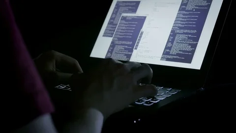 Close-up of hacker giving bad commands to the system Stock Footage 72544254
