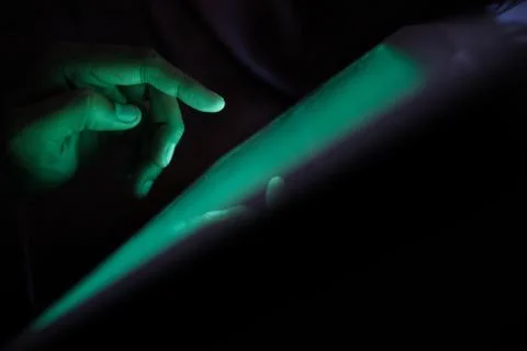 Close up of hacker hand stealing data, cyber crime Stock Photos