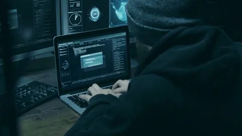 Close up of hacker hands typing app using digital laptop computer. typing a Stock Footage 334586366