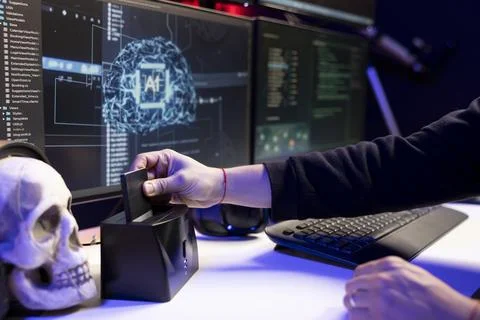 Close up of hacker uploading stolen data on SSD after break into systems Stock Photos
