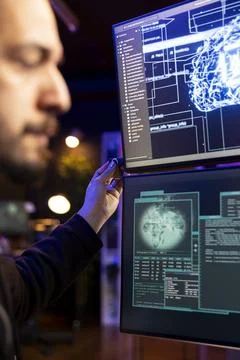 Close up of hacker using artificial intelligence software on USB stick Foto stock