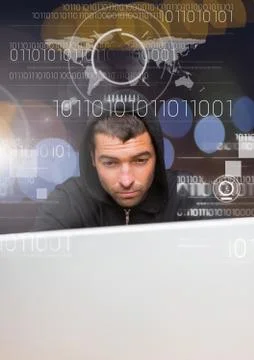 Close up of hacker using a laptop behind a 3D digital screen Foto stock
