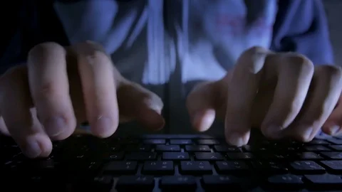 Close-up of hacker's hands quickly typing on the keyboard 스톡 동영상 72542779
