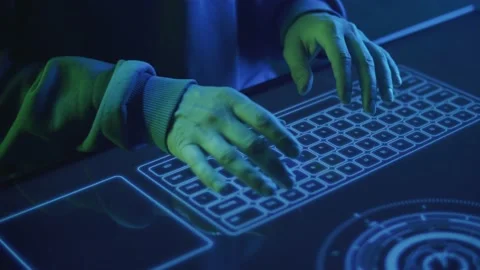 Close-up of a hacker's hands typing text on a touch keyboard Stockbeeldmateriaal 204103532