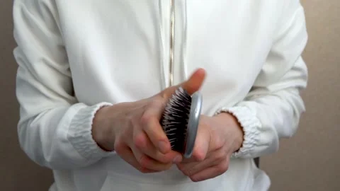Close-up of the hair on the comb.  Stock Footage 155000509