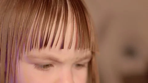 Close-Up Haircut: Sharp Scissors Trim Hair Strands. 動画素材 261756265