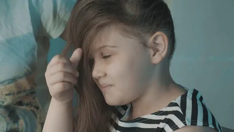 Close up hairstyling. Initial stage of creating a hairdress by a professional Stock Footage 77824652