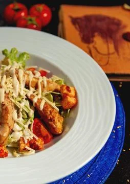 Close up of half of the caesar salad Stock Photos