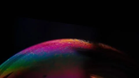 Close up of half circle a soap bubble surface multicolored in motion isolated Stock Footage 154628139