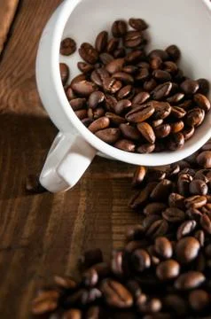Close-up of half a cup of coffee beans Stock Photos