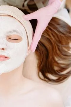 Close-up of half of the face with the mask applied Stock Photos