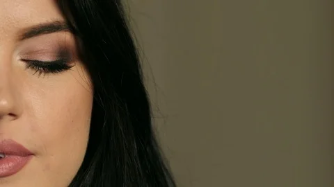 Close up half face woman looking into camera Video stock 83666810