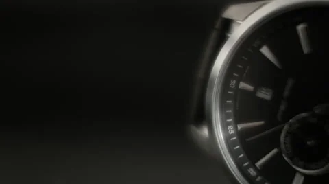 Close up of a half faced Black Wrist Watch against dark background Stock Footage 68191688