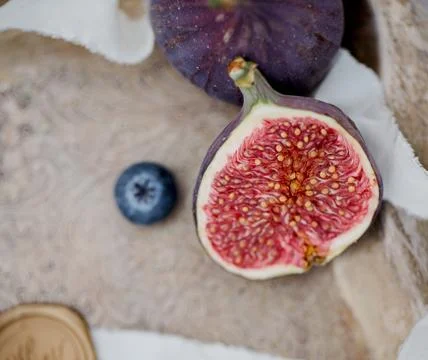 A close up of half of a fig Stock Photos