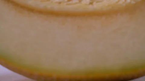 Close Up of Half a Melon Panning Up. Cantaloupe, Exotic Fruit Video stock 128272995