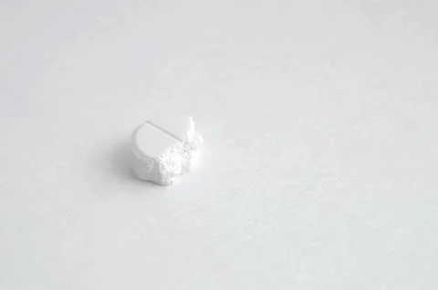 Close-up of half a pill lying on the table Stock Photos