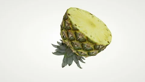 Close up of half pineapple rotating seamless loop against white Stock Footage 117793316