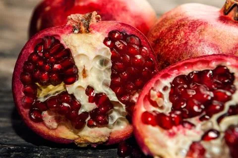 Close up of half pomegranate Stock Photos