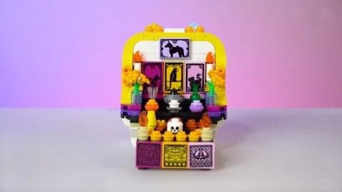 Close-up of Halloween nails while constructing a LEGO model, landscape Stock Footage 329584578