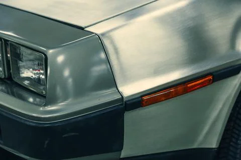 Close-up halogen headlight of white retro car. Stock Photos