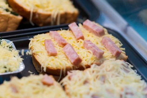 Close up of ham bread with Cheese, thai street food market Stock Photos