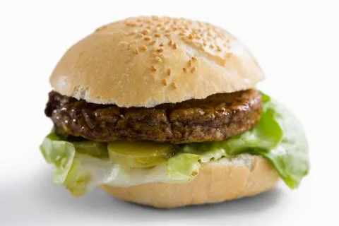 Close up of hamburger with leaf vegetable Foto stock