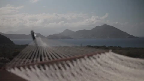 Close-up of hammock with islands on the background Stock Footage 260578343