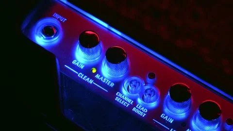 Close up of Hand Adjusting Amplifier Sound setting Stock Footage 124086779