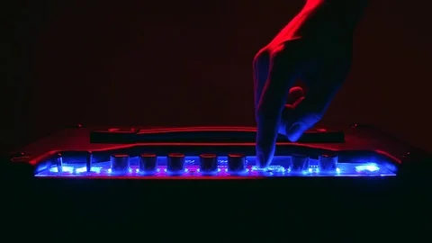 Close up of Hand Adjusting the Modern Amplifier setting 動画素材 123858996