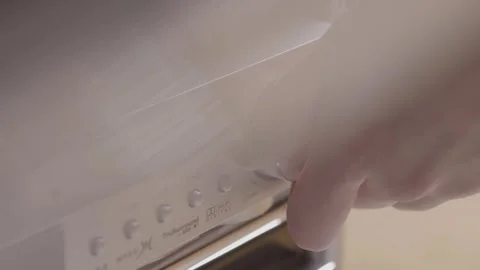Close-up of a hand adjusting the volume on a modern audio receiver Stock Footage 279720969