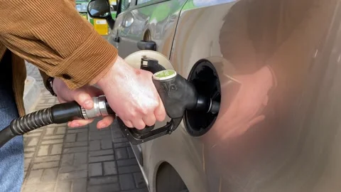 Close up of hand and fuel injector in car tank. Fuel, gas station, gasoline Stock Footage 237190986
