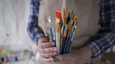 Close-up of hand artist with brushes. Stock Footage 131031850
