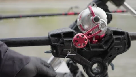 Close Up Of A Hand Attaching A Line To A Heavy Duty Sport Fishing Rod And Reel Stock Footage 275064265