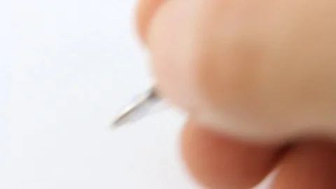 Close-up hand with blue ballpoint pen writes letter message love you Video stock 126998746