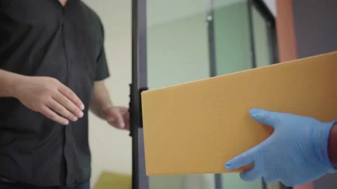 Close up hand Blue delivery man wearing protection mask and medical rubber glove Stock Footage 149805053