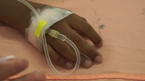 Close up hand boy in saline solution Stock Footage 108471591