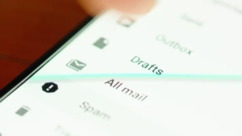 Close up of hand browsing through mail folders a smartphone screen Stock Footage 92755720