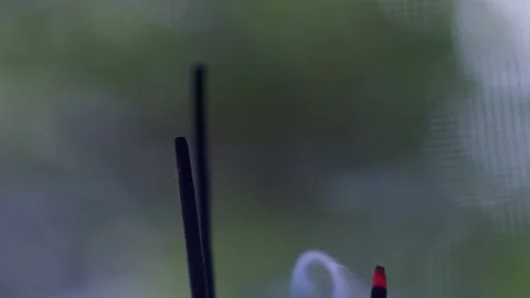 Close up hand burning incense Video stock 134462735