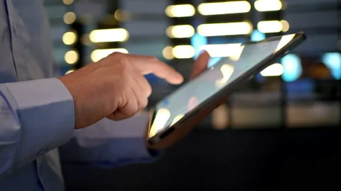 Close-up hand of business man using monitor tablet computer on background Stock Footage 170475403